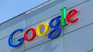 Zurich, Switzerland - 24 June, 2015: Google sign on the wall of the Google office building. Google is a multinational technology company specializing in Internet-related services and products.